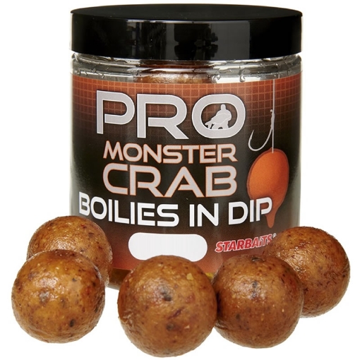 Selektivní dipované boilies Starbaits Monster Crab 24mm s intenzivní pachovou stopou.